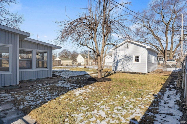 view of yard layered in snow