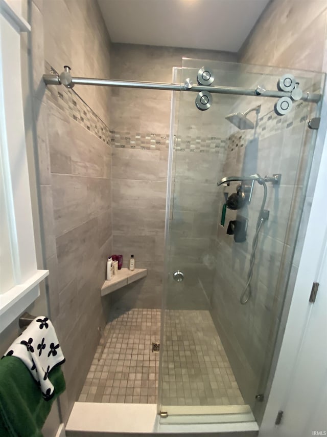 bathroom with an enclosed shower