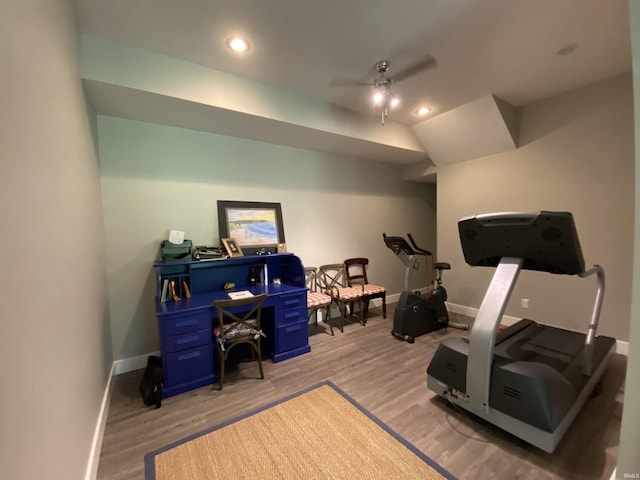 workout room with light hardwood / wood-style floors