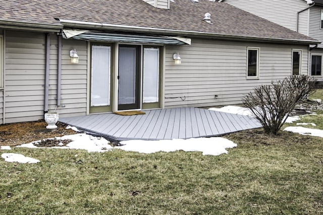 entrance to property with a yard