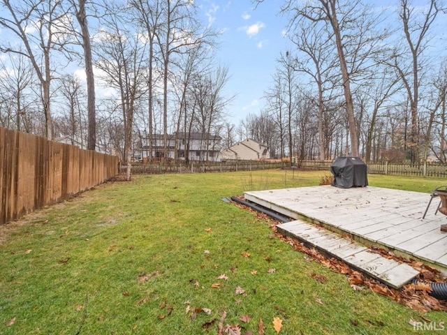 view of yard featuring a wooden deck