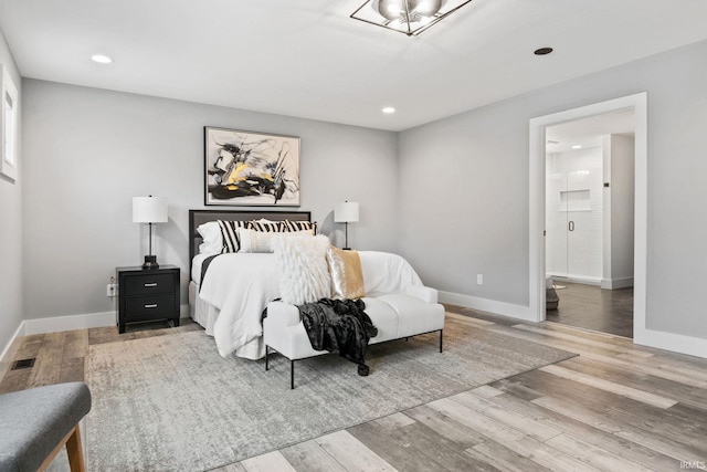 bedroom with wood-type flooring