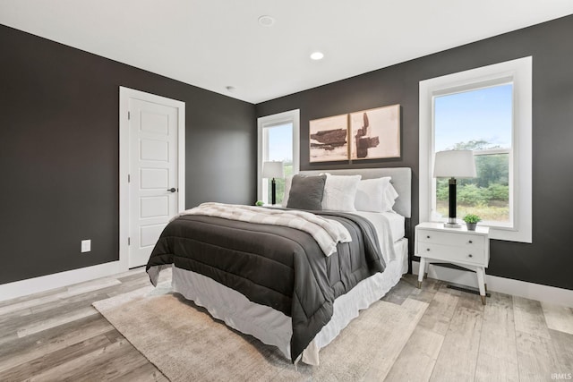 bedroom featuring light hardwood / wood-style flooring