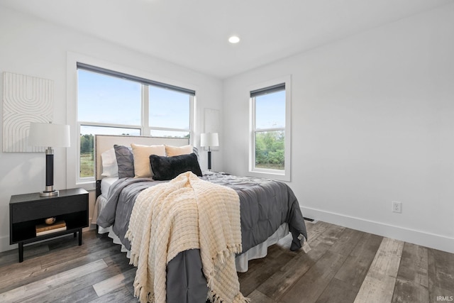 bedroom featuring dark hardwood / wood-style floors