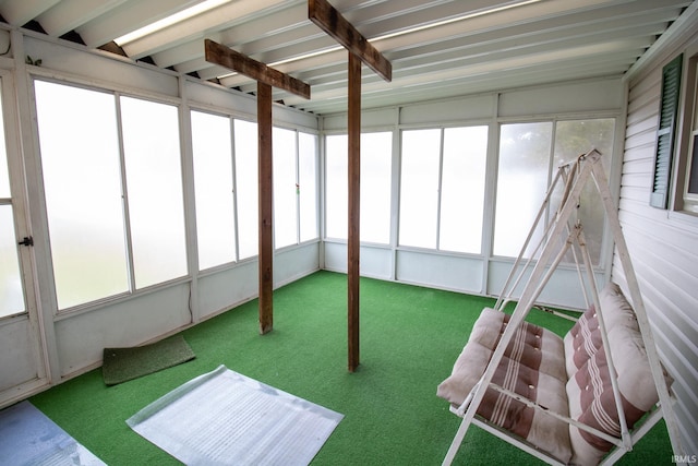 unfurnished sunroom featuring plenty of natural light