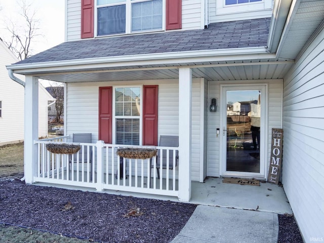 doorway to property featuring a porch