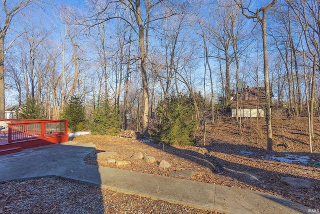 view of yard featuring a wooden deck