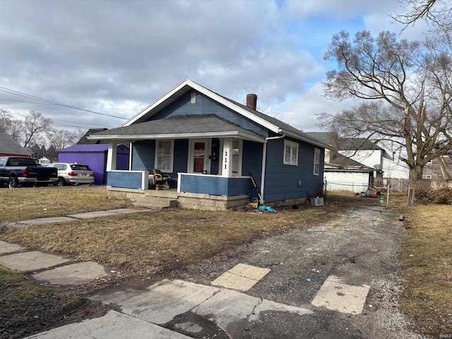 bungalow-style house with covered porch