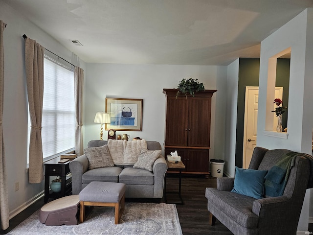 living room with dark hardwood / wood-style floors