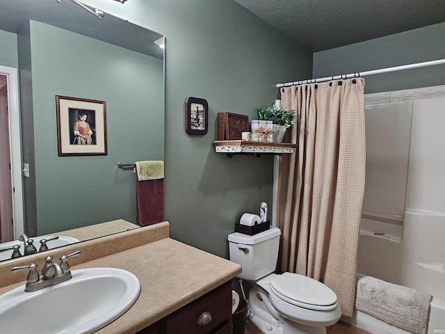 full bathroom with vanity, shower / bathtub combination with curtain, and toilet