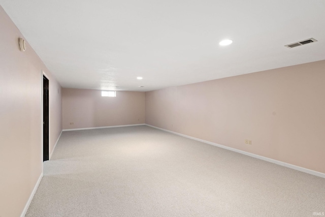 interior space featuring light colored carpet