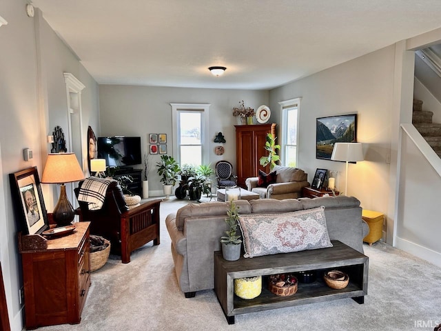 living room featuring light colored carpet