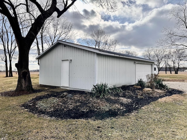 view of outbuilding with a garage