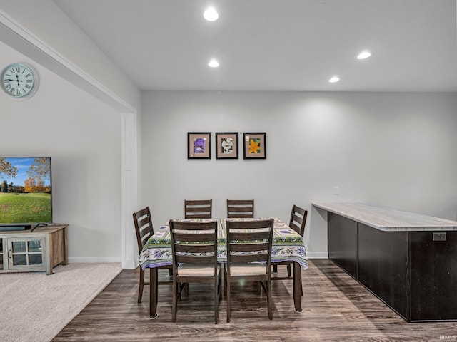 dining room featuring dark hardwood / wood-style flooring