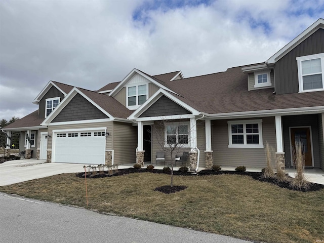 craftsman-style house with a front lawn