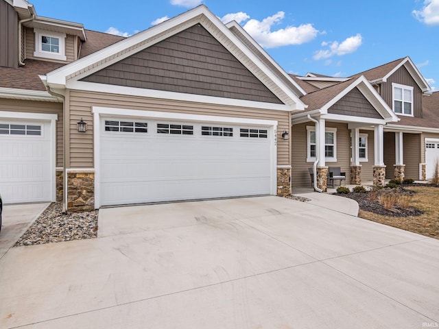 craftsman-style house featuring a garage