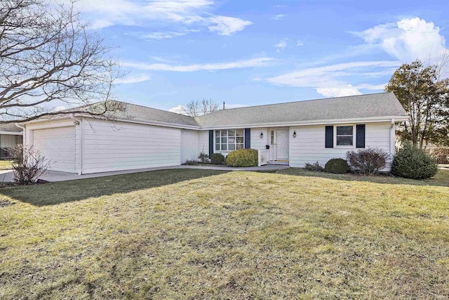 ranch-style home with a garage and a front yard