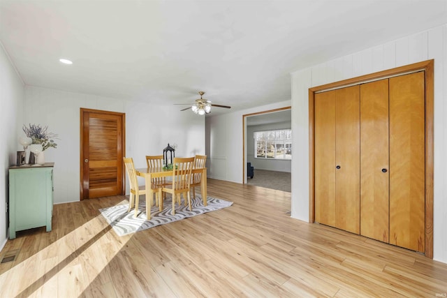 dining room featuring ceiling fan and light wood-type flooring