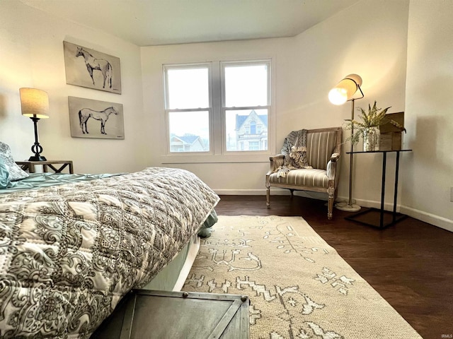 bedroom featuring dark hardwood / wood-style floors