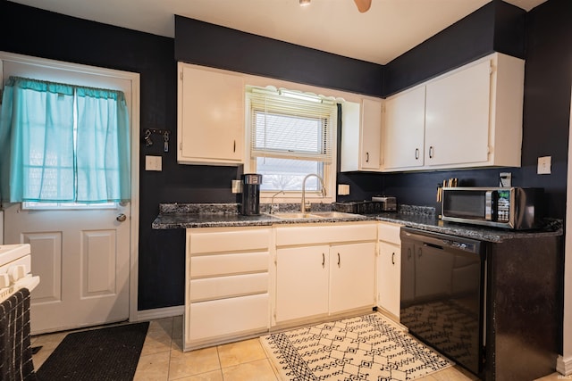 kitchen featuring white cabinetry, dishwasher, sink, and light tile patterned floors