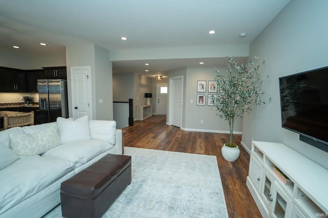 living room featuring dark hardwood / wood-style flooring