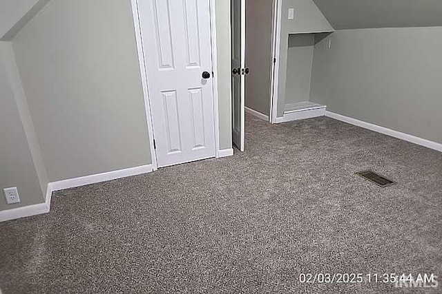 bonus room featuring vaulted ceiling