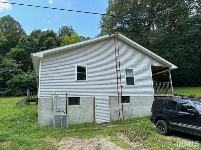 view of property exterior with central air condition unit