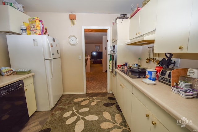 kitchen with dark wood-type flooring and black appliances