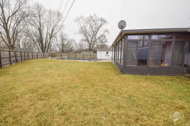 view of yard featuring a sunroom