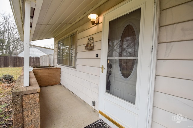 entrance to property with a porch