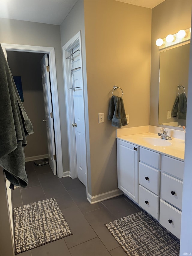 bathroom featuring vanity and tile patterned flooring