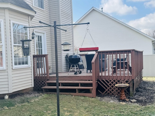 rear view of house with a wooden deck