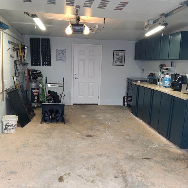 garage featuring a garage door opener