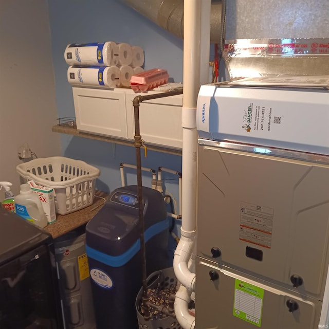 laundry area with washer / dryer