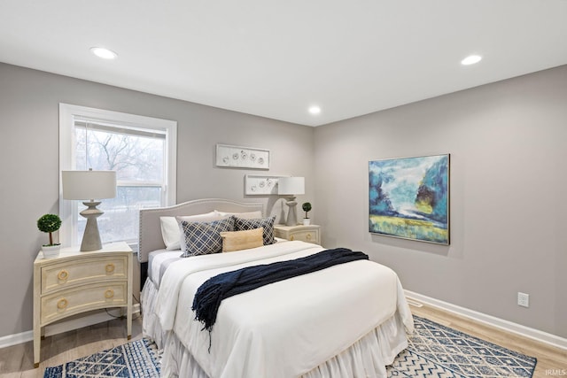 bedroom featuring hardwood / wood-style flooring