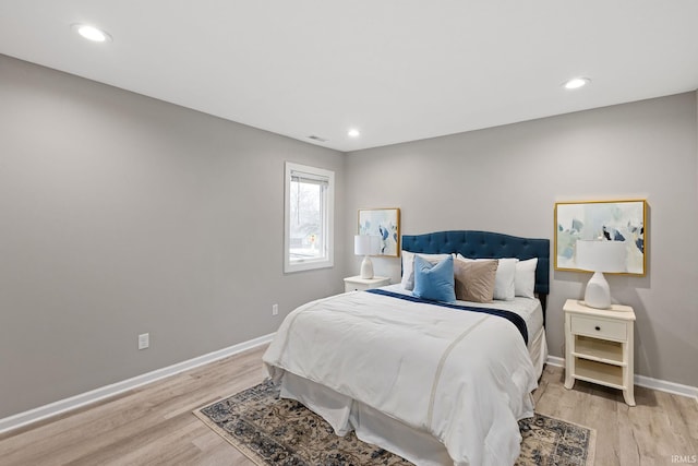 bedroom featuring light hardwood / wood-style floors