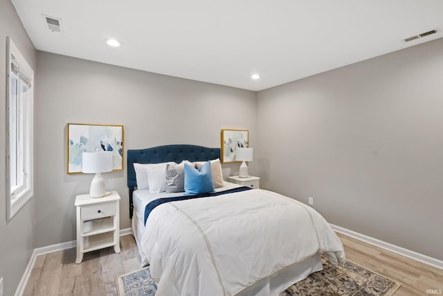 bedroom featuring light wood-type flooring