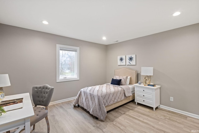 bedroom with light hardwood / wood-style flooring