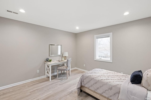 bedroom featuring light hardwood / wood-style floors