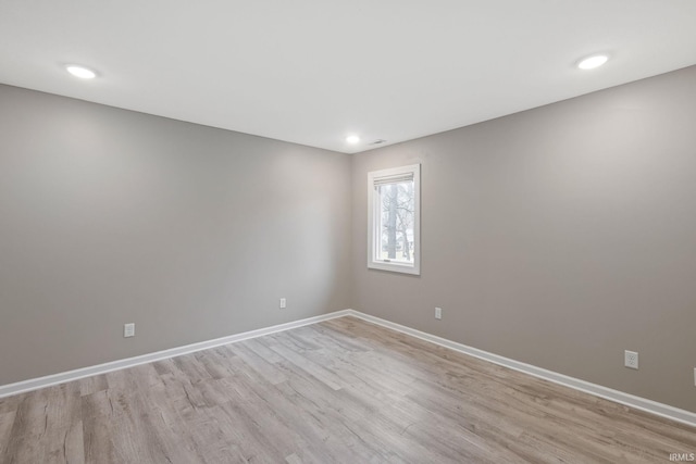 unfurnished room featuring light hardwood / wood-style flooring