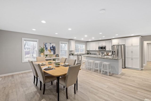 dining area featuring light hardwood / wood-style flooring