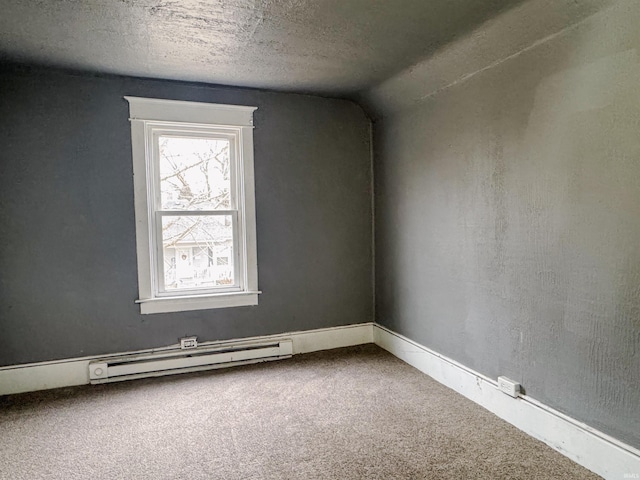 unfurnished room featuring carpet flooring, lofted ceiling, a textured ceiling, and baseboard heating