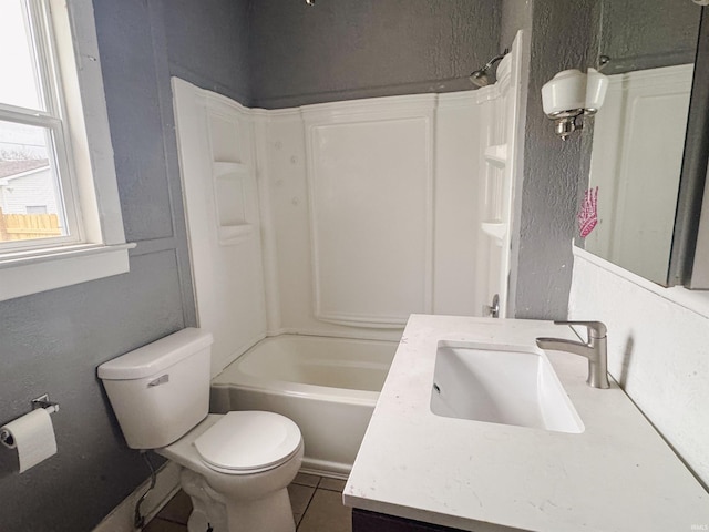 full bathroom with tile patterned flooring, vanity,  shower combination, and toilet