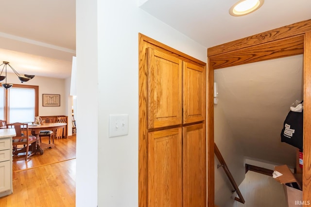 kitchen featuring white cabinetry and light wood-type flooring