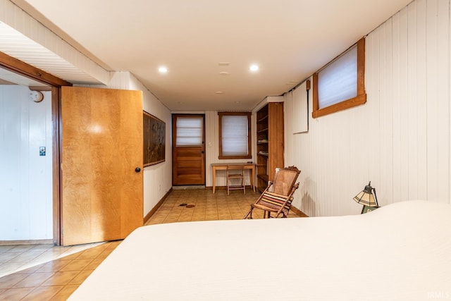 bedroom featuring light tile patterned floors