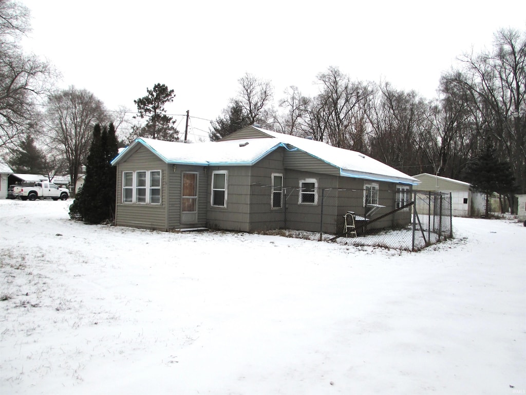 view of snow covered property