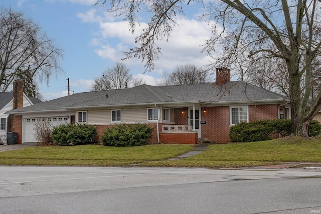 ranch-style house with a garage, a porch, and a front lawn