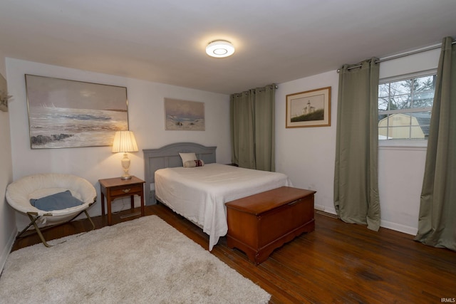 bedroom featuring dark hardwood / wood-style floors