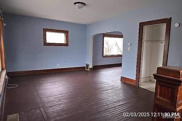 empty room featuring dark hardwood / wood-style floors