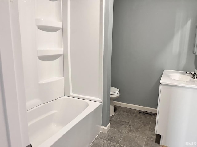 full bathroom featuring vanity, toilet, and  shower combination